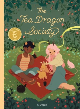 cover of tea dragon society, two people with horns on their head on a picnic blanket tending to a dragon