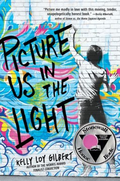 写真集「Us In The Light」のブックカバー