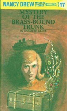 Mystery of the brass-bound trunk / by Carolyn Keene.
