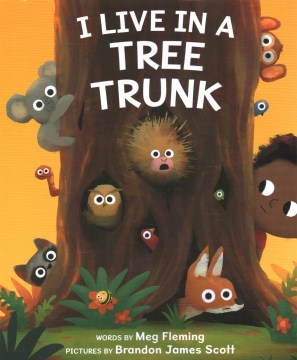 I live in a tree trunk / words by Meg Fleming   pictures by Brandon James Scott