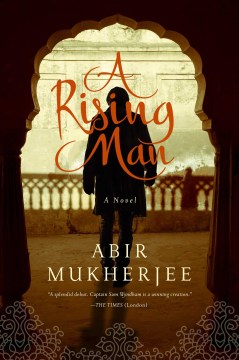Book cover of A Rising Man by Abir Mukherjee with a picture of a man on a balcony.